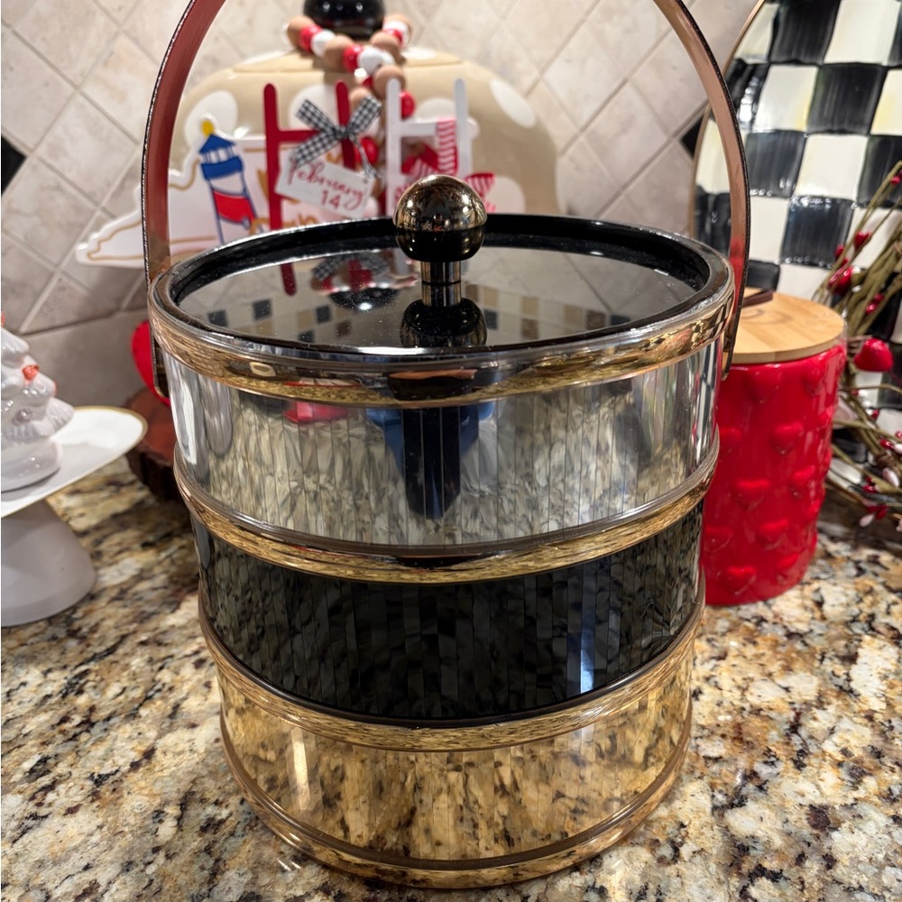 Rare mid century vintage ice bucket in the Triple Reflections design.